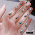 Three-dimensional tulip fingernail decoration made from alloy in solid colour style on a nail