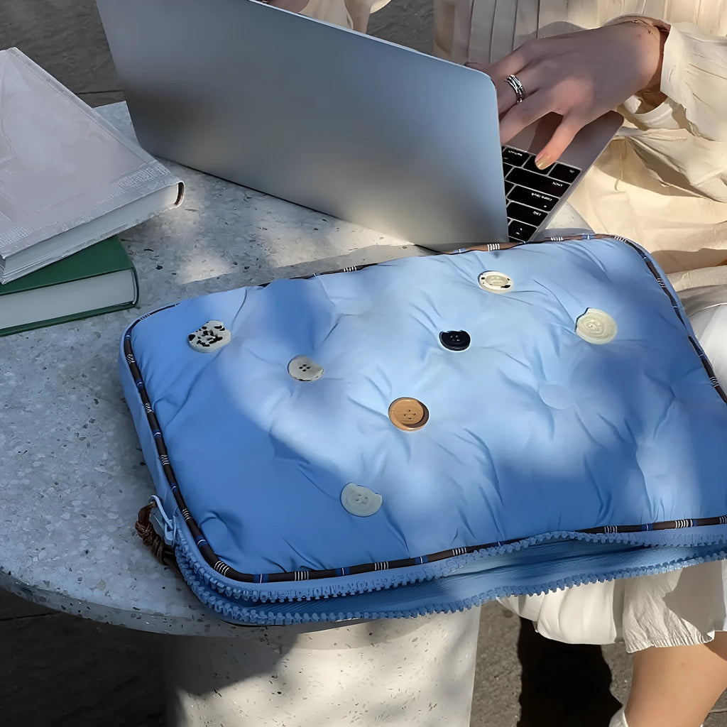 Blue plaid pattern nylon laptop sleeve case for a 14-inch computer, shown with a size tag.