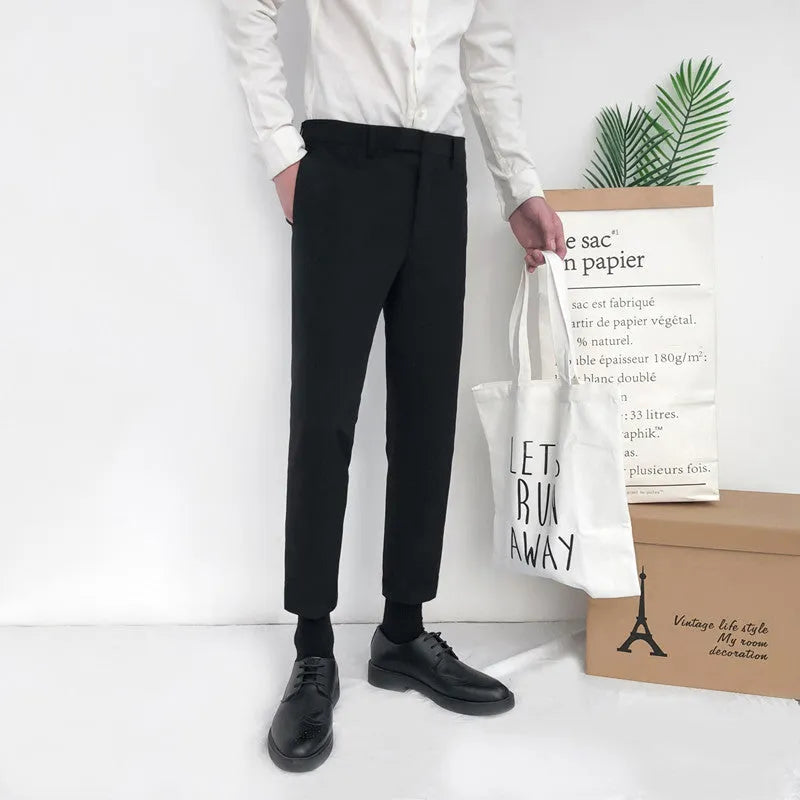 Men's straight-leg cotton trousers with drawstring waist in black, available in sizes 28-34