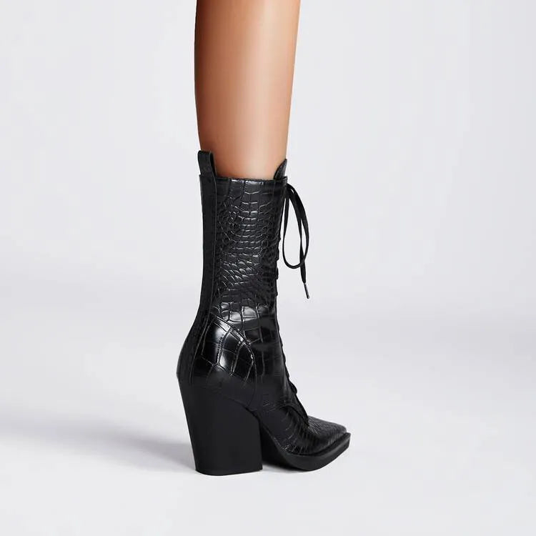 Dark brown retro pointed toe boots with a chunky heel and lace detail, side zipper visible.