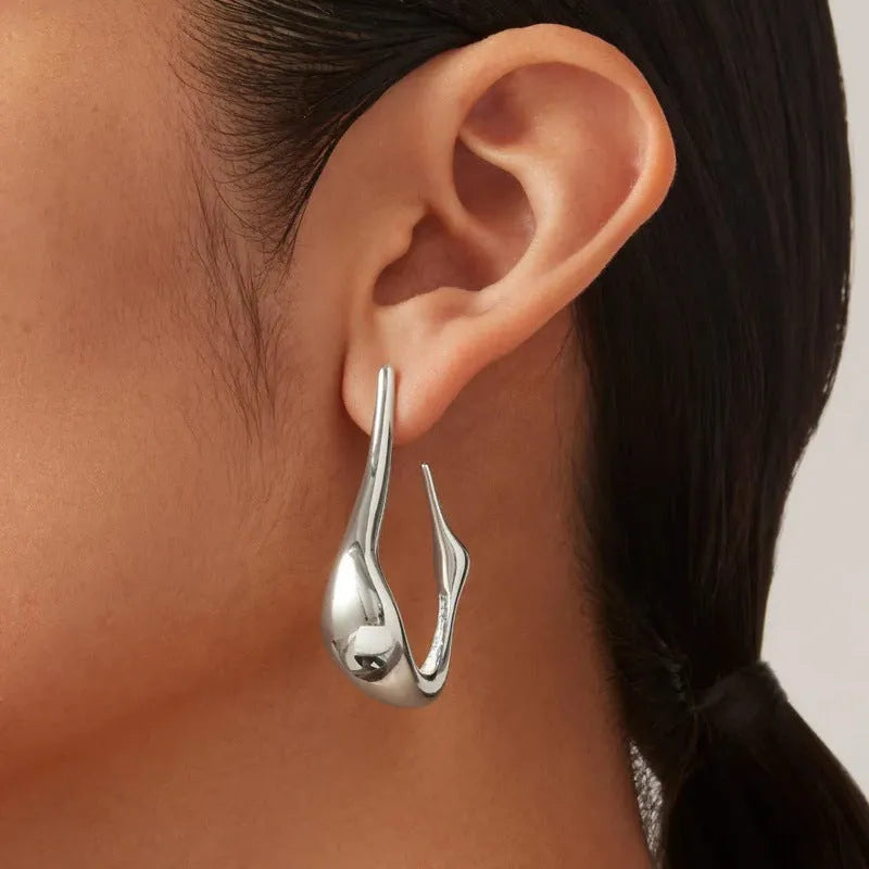 Copper plating 18K real gold irregular lines geometric needle ear studs on white background