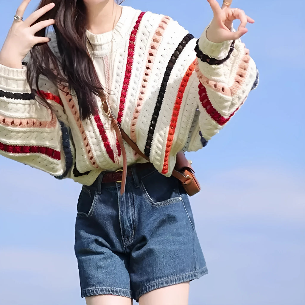 Colourful rainbow striped hollow knit sweater with batwing sleeves and round neck