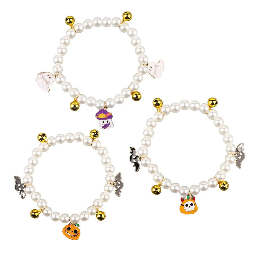 Halloween cat collar with simulated pearl necklace and pumpkin designs including purple ghost, skull, and smiling patterns