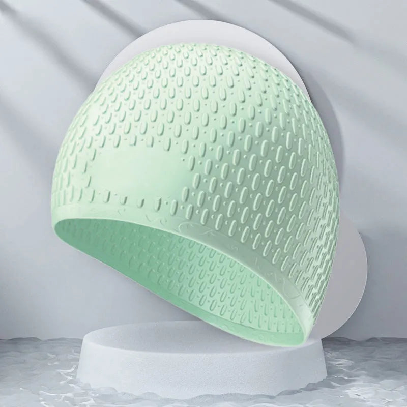 Solid colour silicone swimming cap with water drop design for adult swimmers