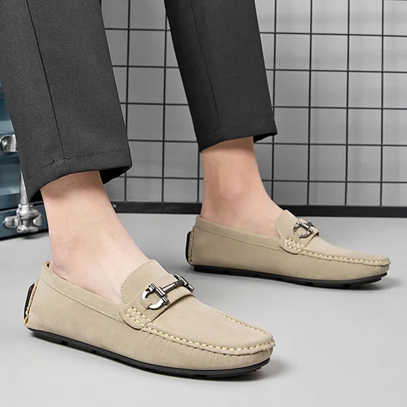 Men's brown casual leather shoes with round toe and rubber sole on a neutral background