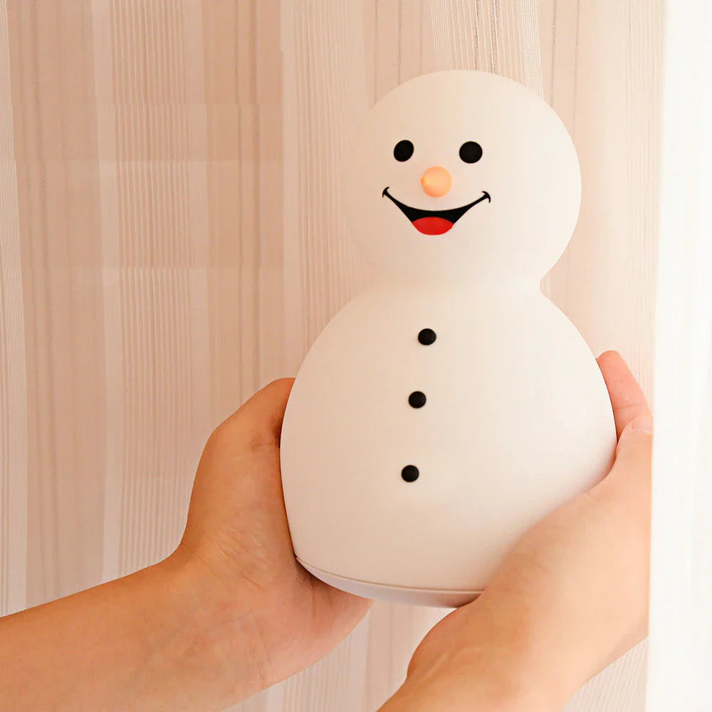 Snowman-shaped rechargeable night light with seven color-changing modes, portable and durable silicone construction