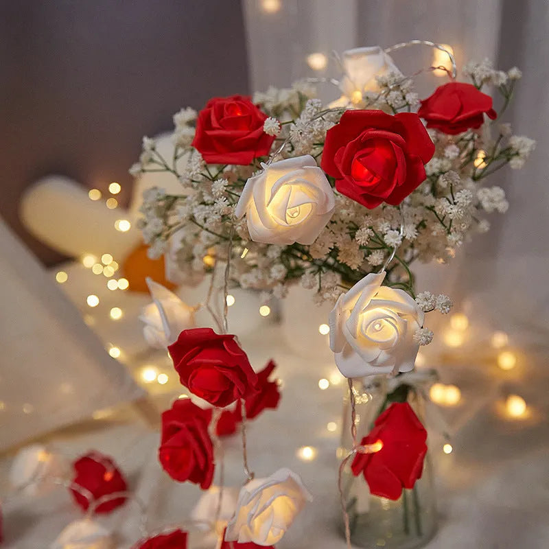 LED rose fairy light string with battery pack for indoor holiday decoration.