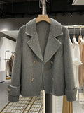 Women's solid colour polyester woolen coat in black, available in S and M sizes, with conventional sleeves
