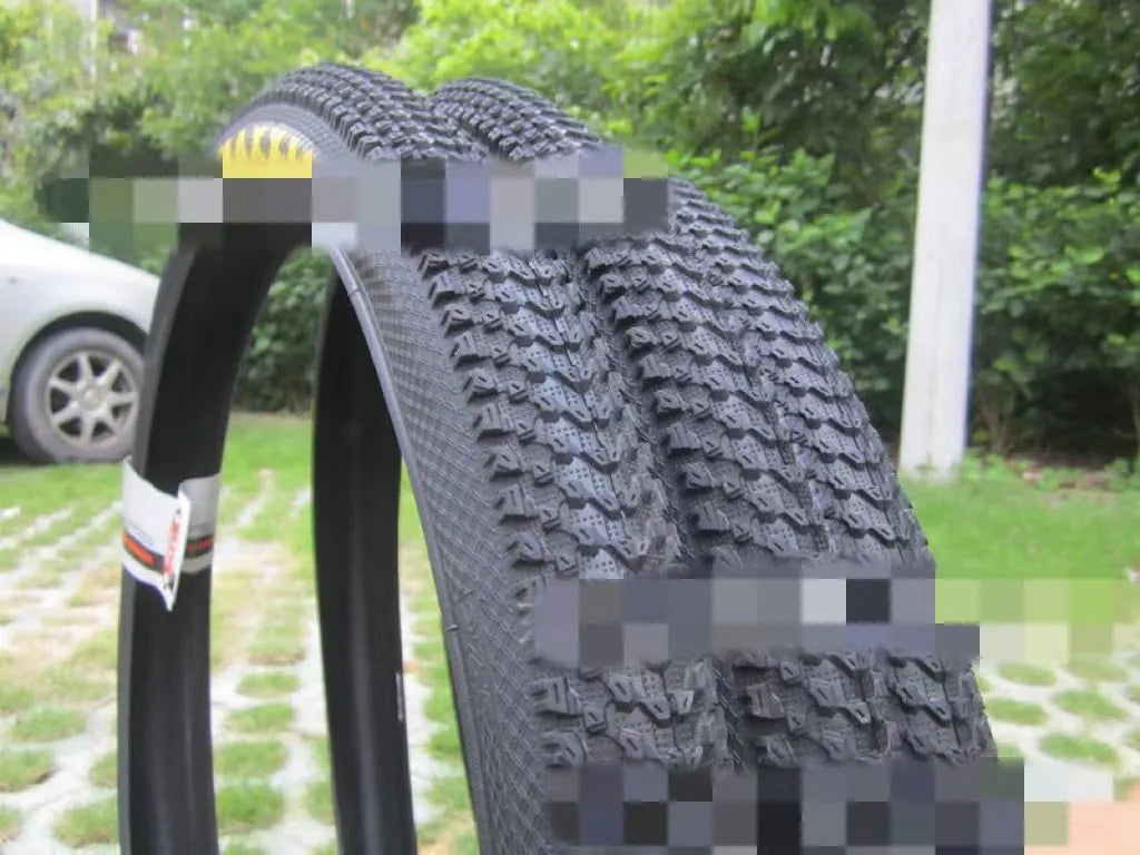 Ultralight puncture-proof mountain bike tyre shown for 26, 27.5 and 29-inch wheel sizes.