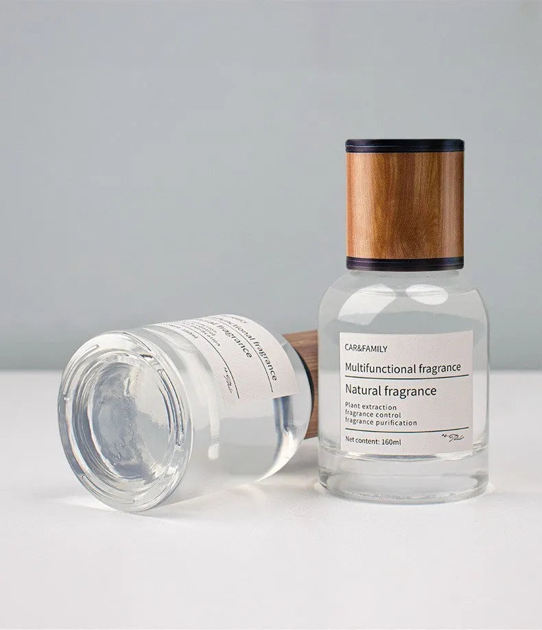 Round glass car mounted fragrance perfume with 160ml liquid, size 120x60mm, in a holder