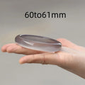 Dark grey iced chalcedony agate bracelet with a continuous circle design on a wrist.