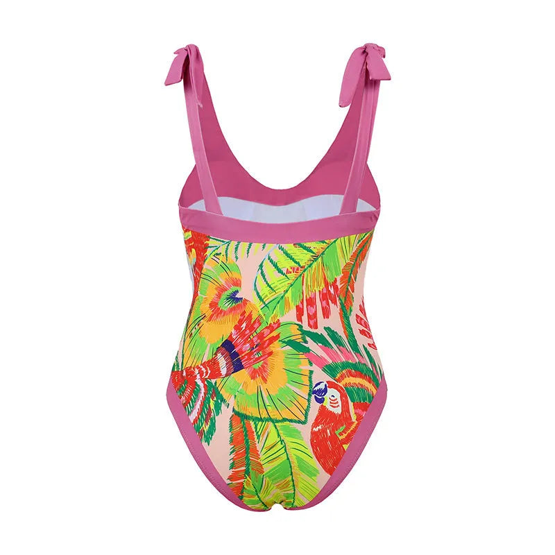 Retro pink floral print one-piece swimsuit with V-neck, thin skirt, and covered belly design.