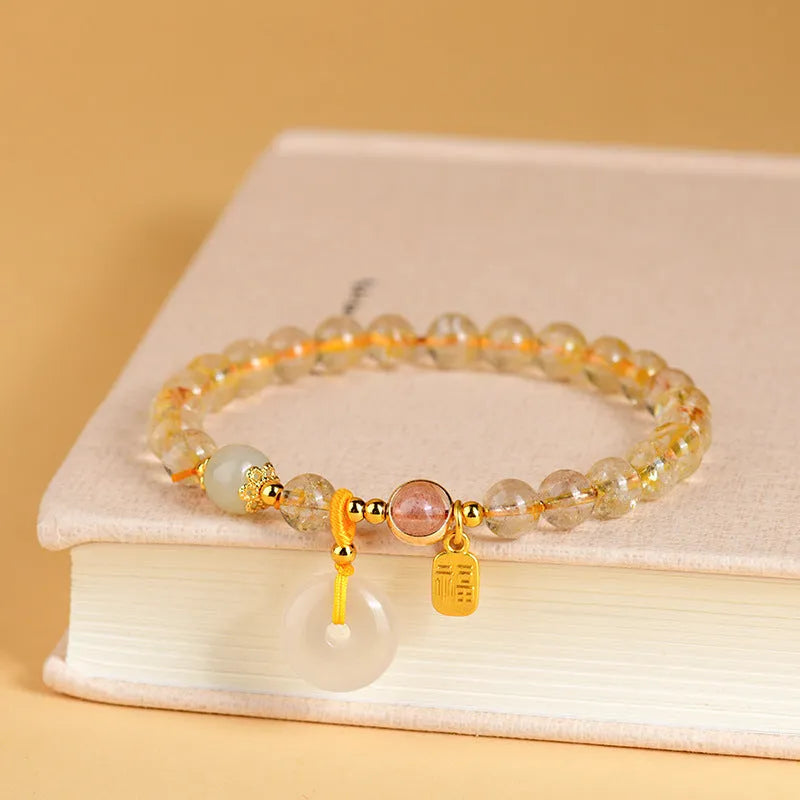 Gold rutilated quartz bracelet with safety buckle and geometric pendant in national style
