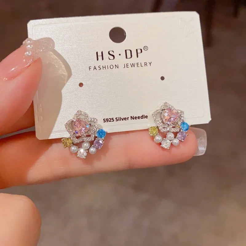 Full diamond silver petal stud earrings for women with real gold plating over copper in a flower shape