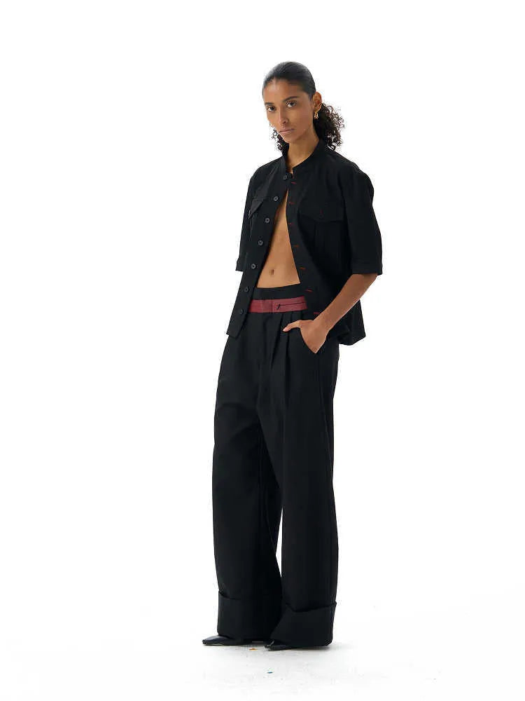 Handmade black loose fit half sleeve men's shirt with a shirt collar.