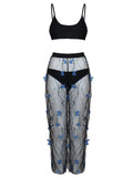 Women's black transparent butterfly pattern bikini three-piece set, showing top, underwear, and pants.