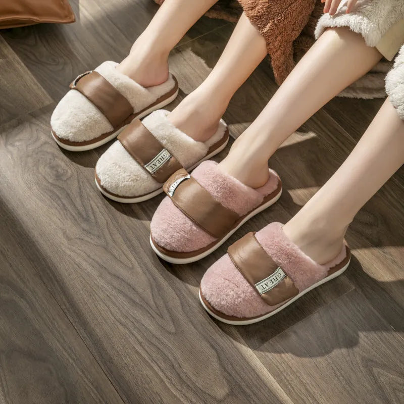 Beige plush cotton indoor slippers with Velcro strap and non-slip plastic sole.