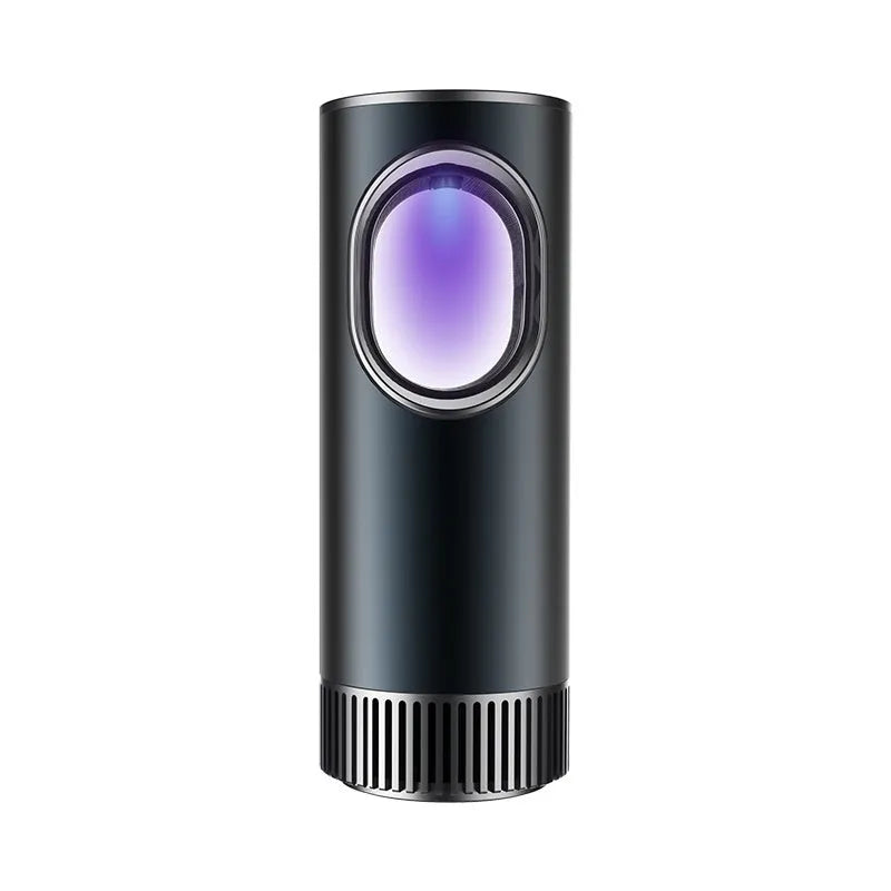 Black compact car air purifier with USB cable for formaldehyde removal and anion generation.