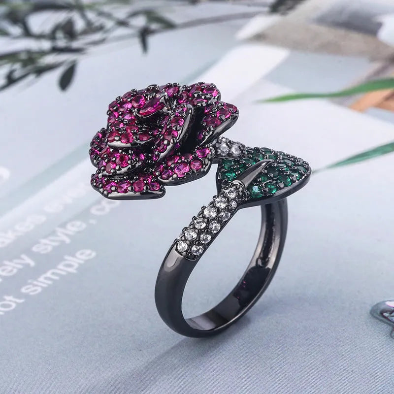 Black gold geometric flower ring with simulated red corundum stone on copper band
