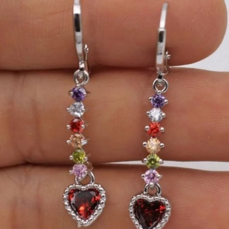 Heart-shaped alloy earrings for women in gold or silver tone with butterfly clasps
