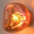 Retro corridor ambient light in gold finish with Alec shell, 15cm diameter, warm light effect