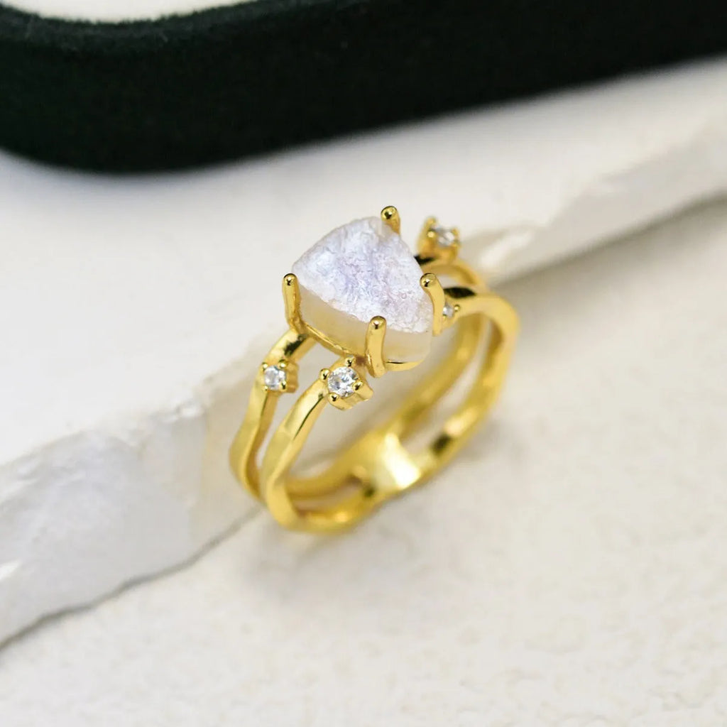 S925 silver irregular triangle ring with a moonstone, shown in rose gold, white gold, and yellow gold finishes.