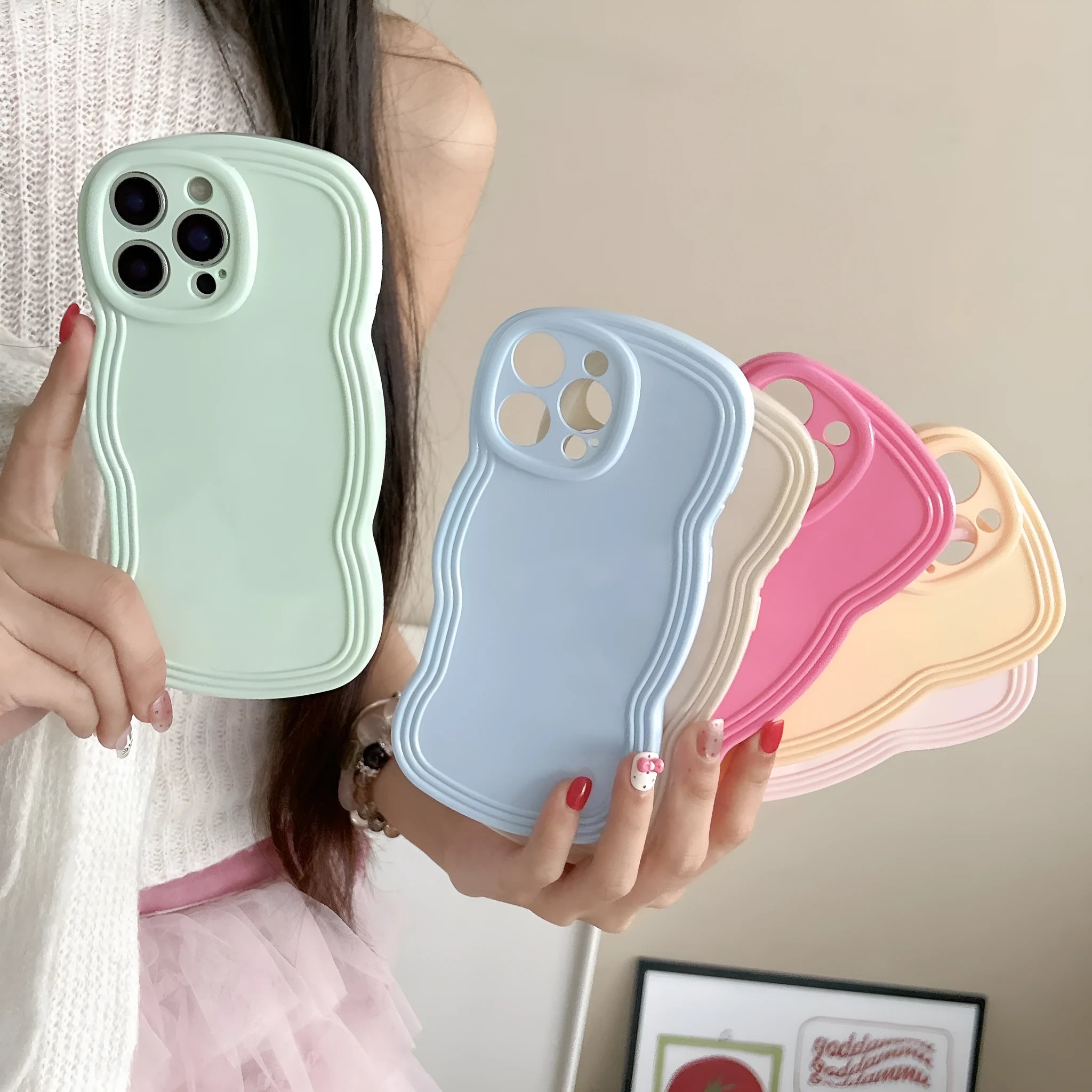Wave pattern iPhone case in cream candy colour showing TPU material and anti-fingerprint surface