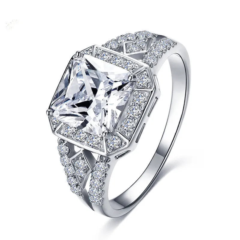Geometric hollow zircon ring in platinum colour with quadrilateral design on copper band