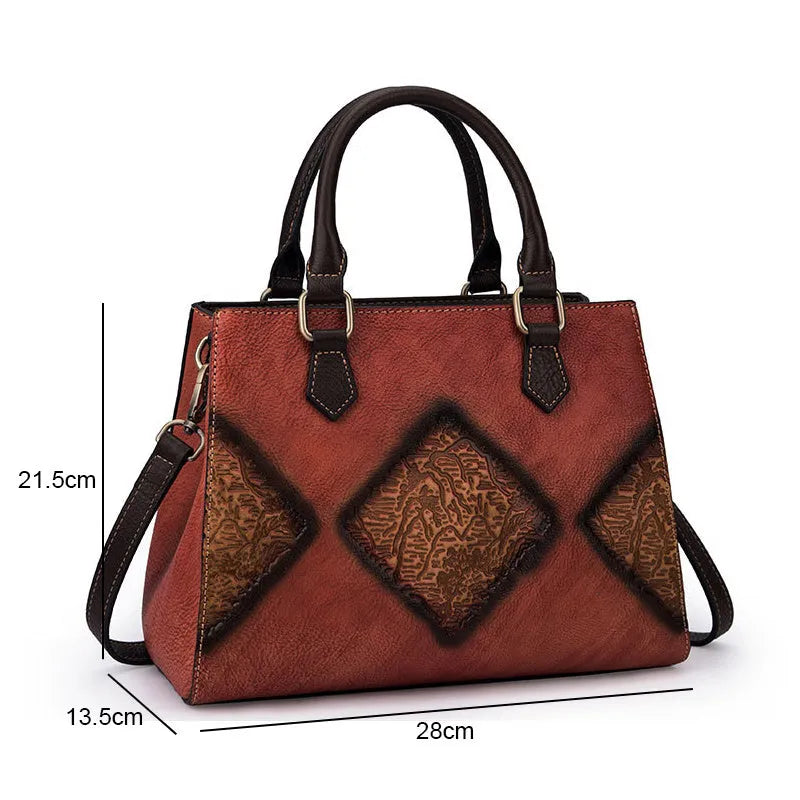 Retro brown top-layer cowhide women's handbag with zipper closure and soft handle, front view