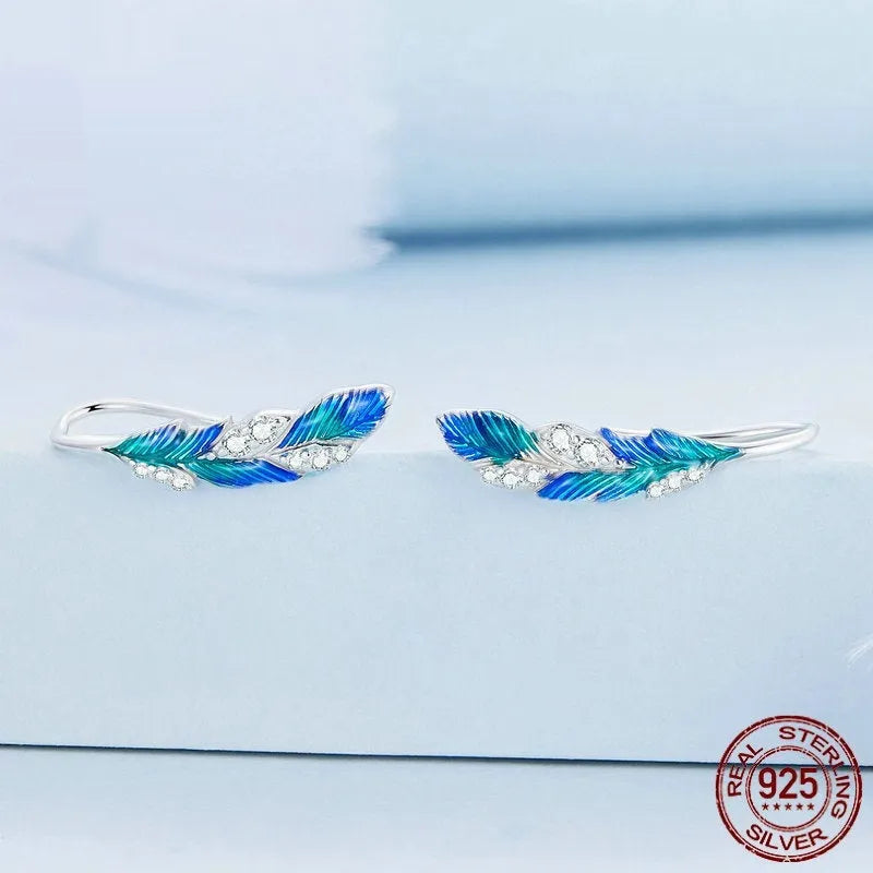 Pair of bright blue gradient feather wing stud earrings white gold plated over 925 silver