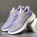 Women's lavender purple Flyknit running shoes with mesh lining and striped pattern, flat heel