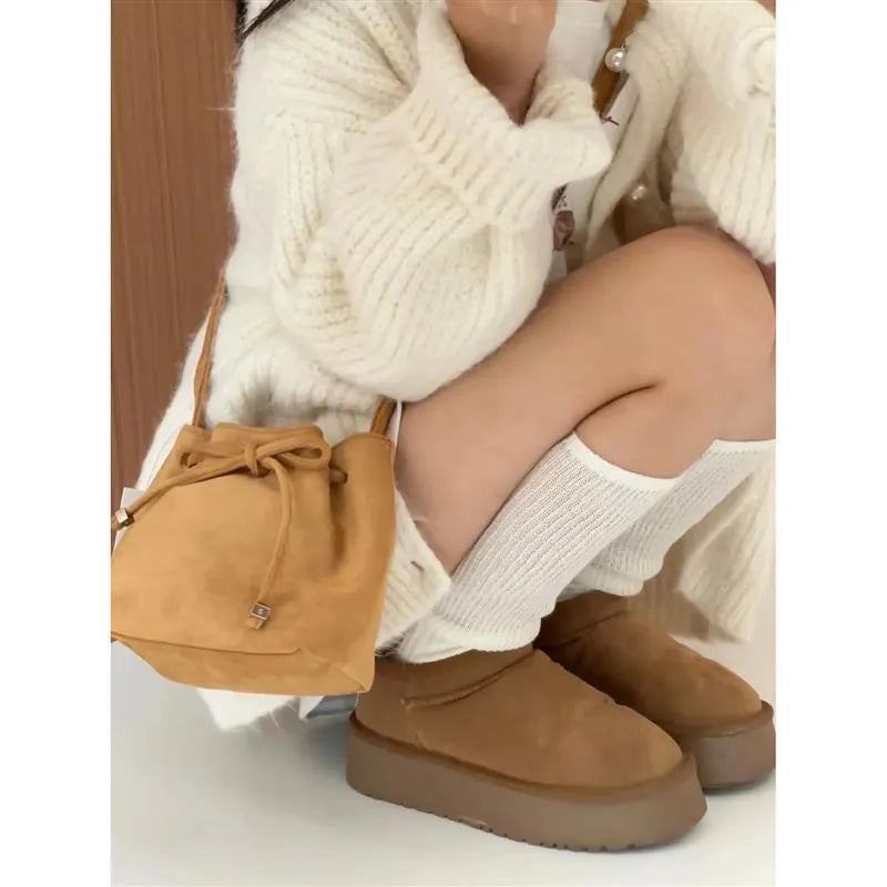 Brown suede crossbody shoulder bag with retro sewing line detail for daily matching