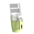 Grey 2-in-1 cat litter scoop with non-slip handle and foldable base on a floor