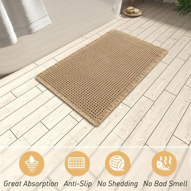 A square checkered pattern bathroom carpet with a non-slip backing in a neutral colour.