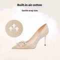 Champagne gold women's high heel pumps with pointed toe and slender stiletto heel on a rubber sole