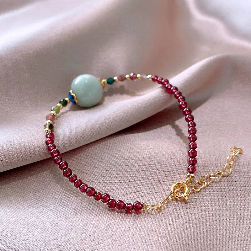 Women's garnet bracelet with aquamarine and tourmaline drop beads in Chinese Korean style design