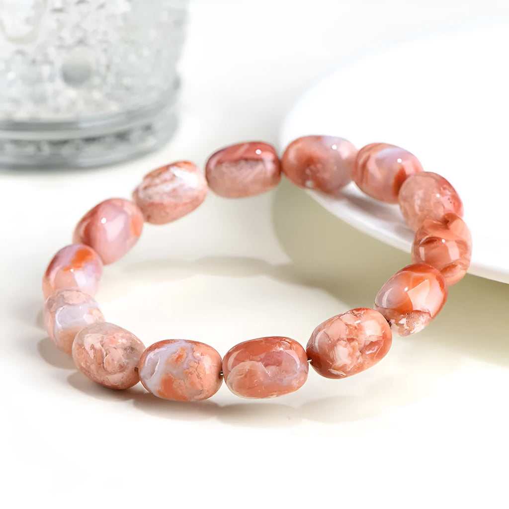 Natural cherry blossom colour agate barrel bead bracelet with Ruyi design elements