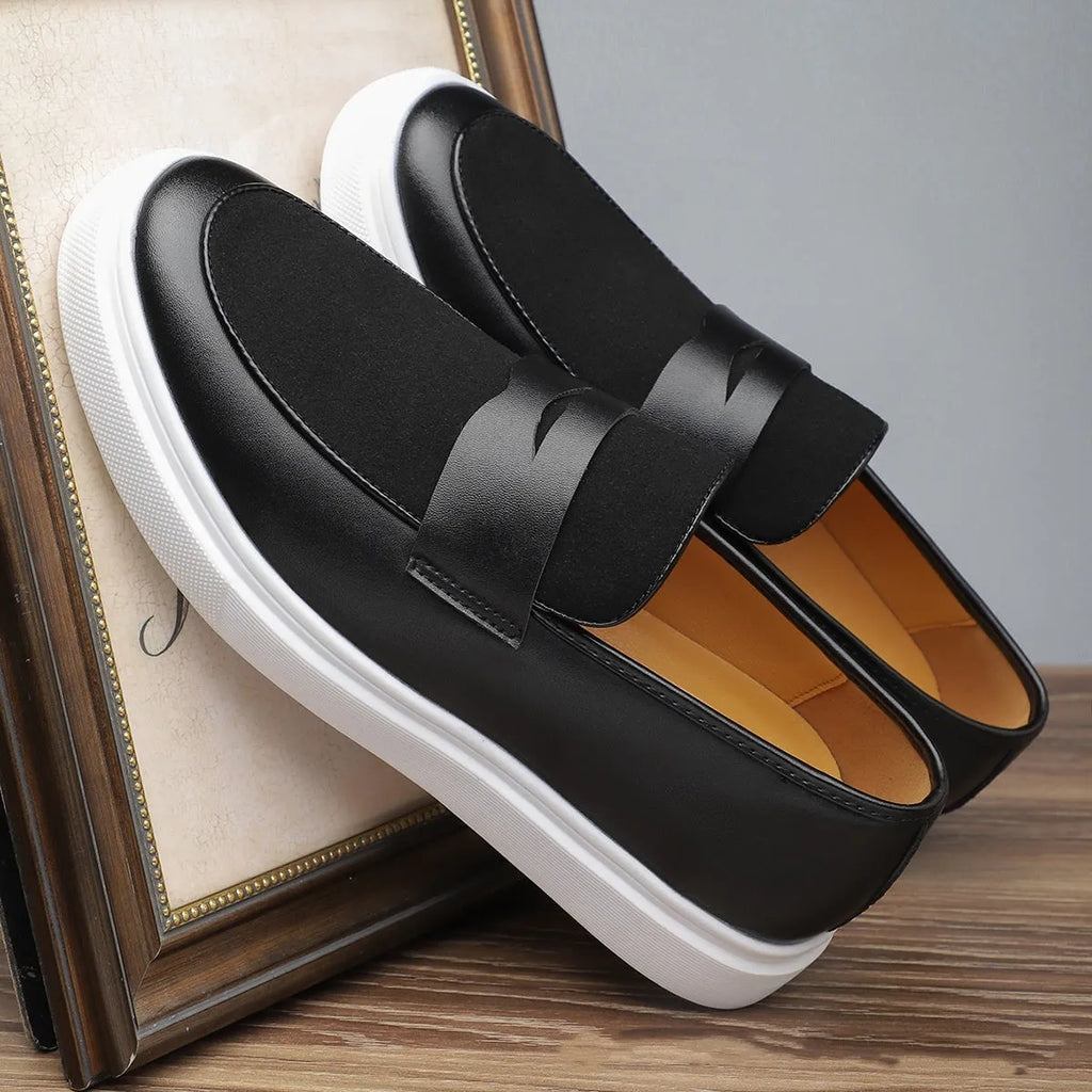 Black men's Gommino slip-on casual shoes with tassel detail and round toe