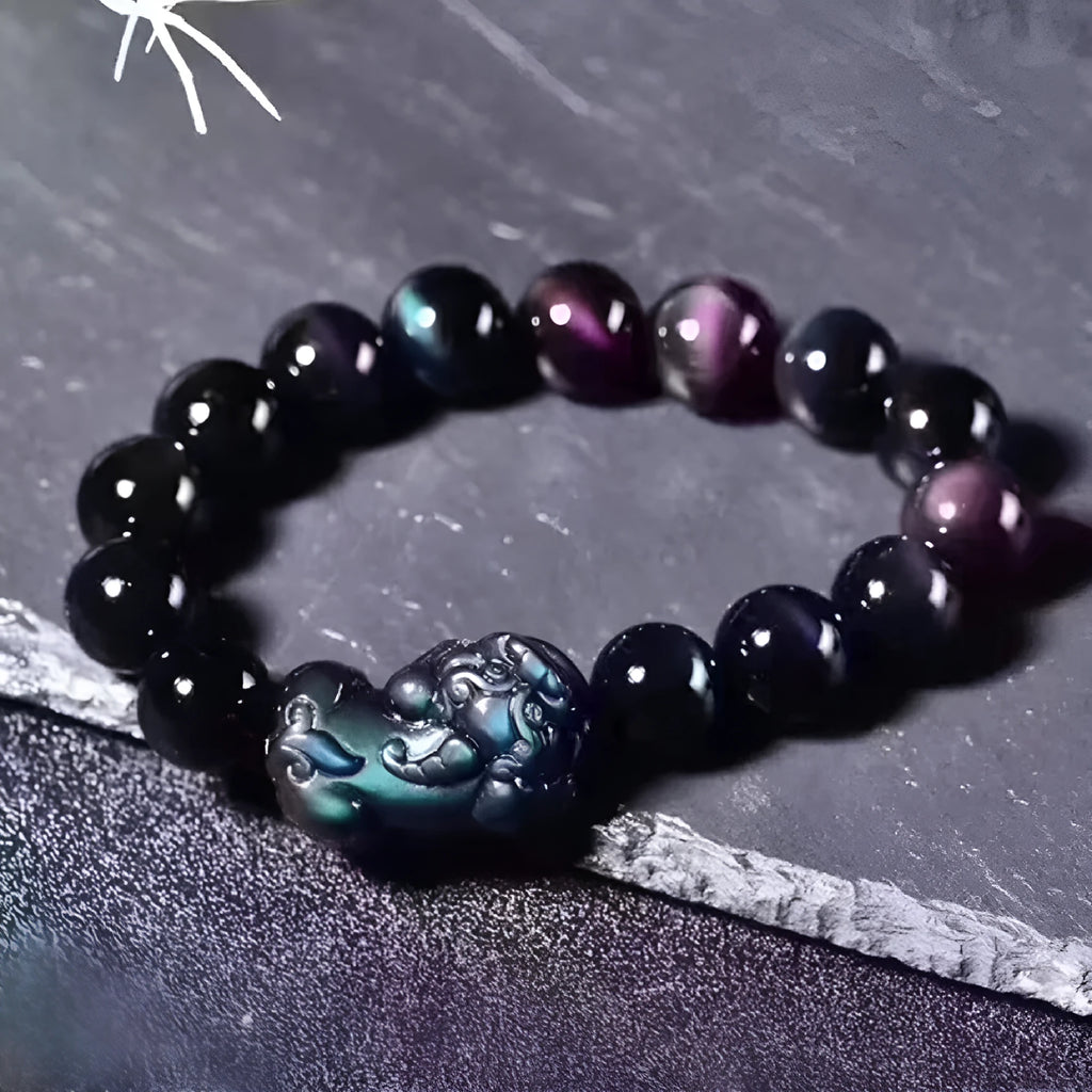 Natural ice colour eye obsidian crystal bracelet with polished round beads on wrist