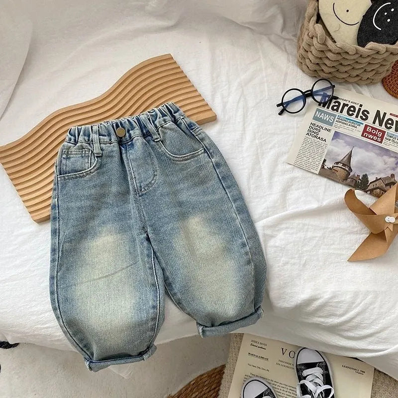 Light coloured boys casual denim jeans with elastic waist and personalised back pocket print