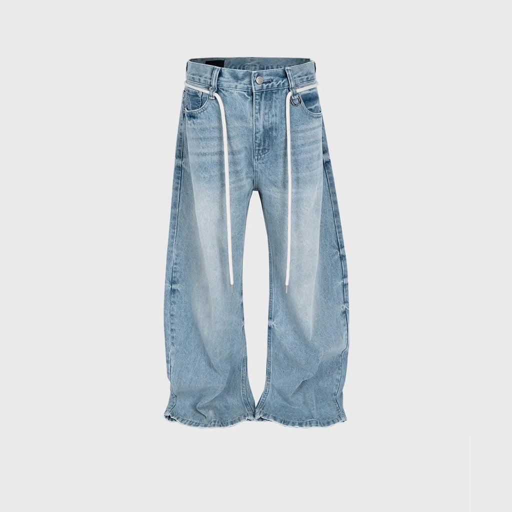 Blue vintage washed straight-leg denim trousers with a drawstring belt and zipper fly.