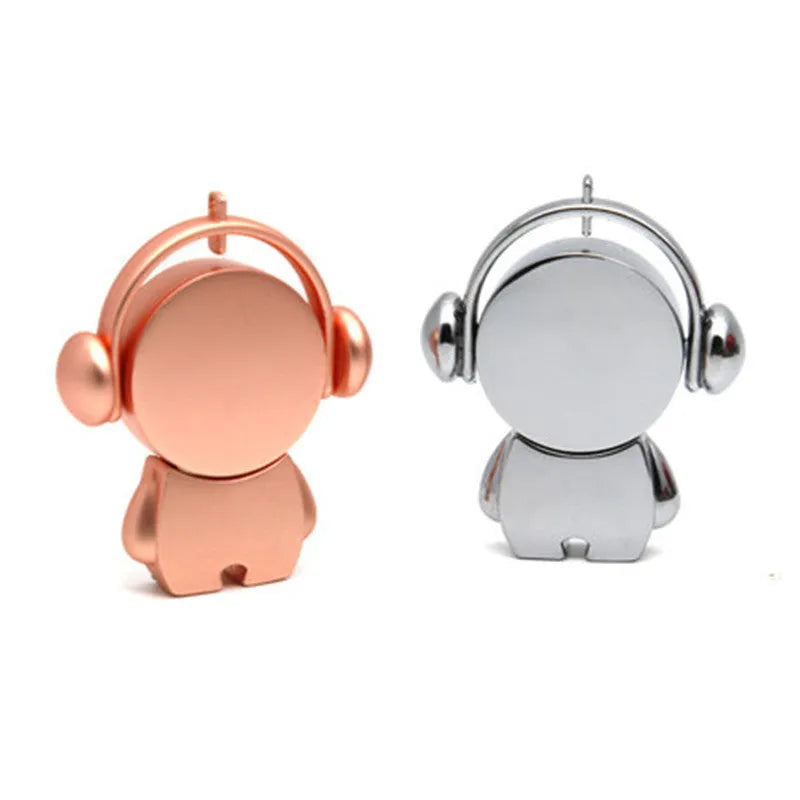 Silver and rose gold metal USB flash drives with a cartoon musician graphic, showing front and side views.