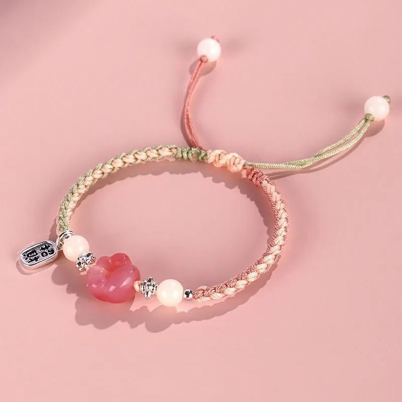 Red cat's paw woven couple bracelet with glass and coloured glaze in pastoral style