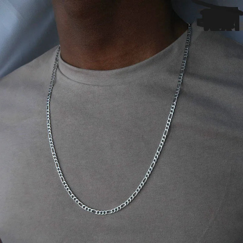 Men's simple electroplated alloy necklace in gold on a grey background