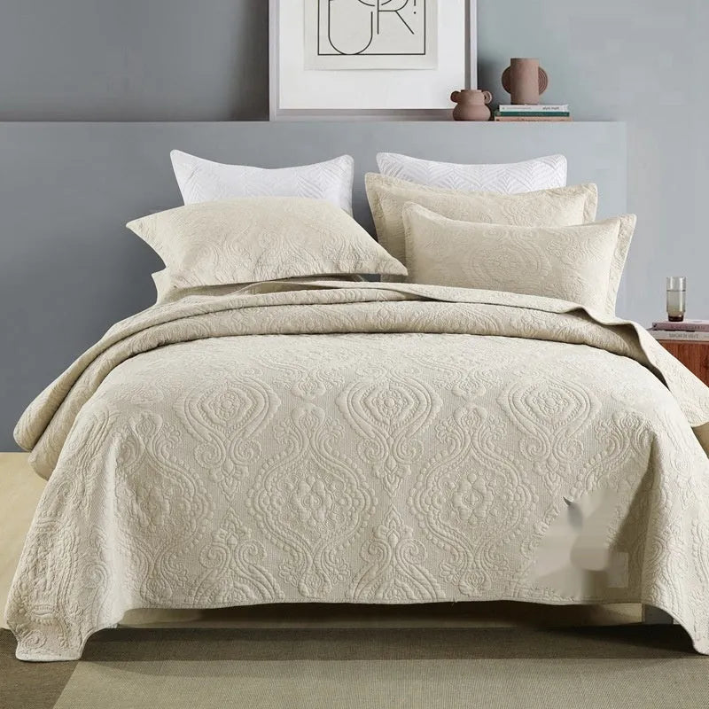 Pure cotton bed cover three-piece set showing damascus pattern in blue colourway on UK standard bed