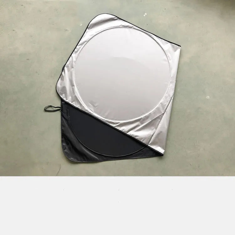Silver reflective car sunshade unrolled showing 190cm by 90cm size next to its cloth storage bag.