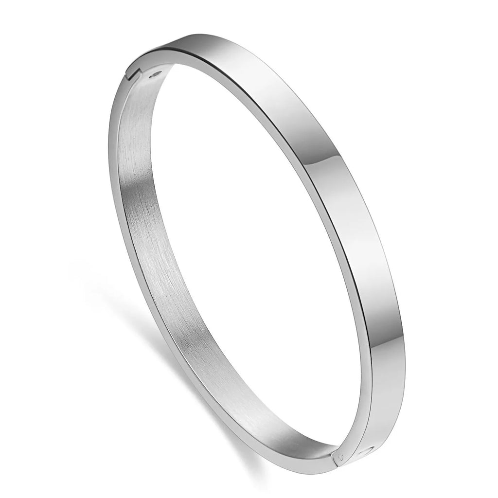 Simple glossy snap bracelet for women in polished stainless steel, oval minimalist design, steel colour or gold