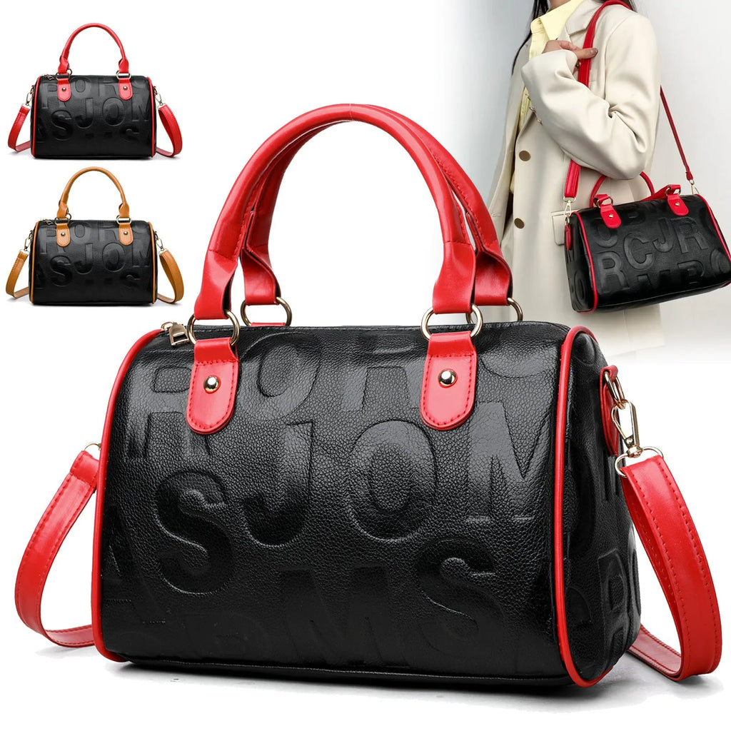 Brown cylindrical leather-effect crossbody bag with three shoulder straps on a table.