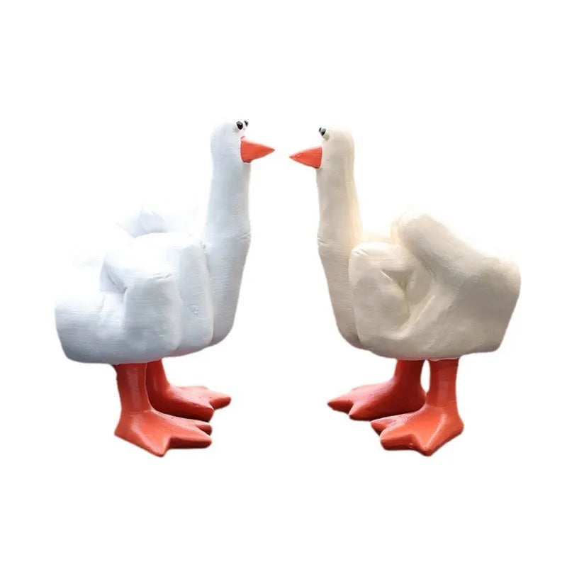 Creative middle finger duck cartoon resin ornament in beige, 50x77mm, on car centre console