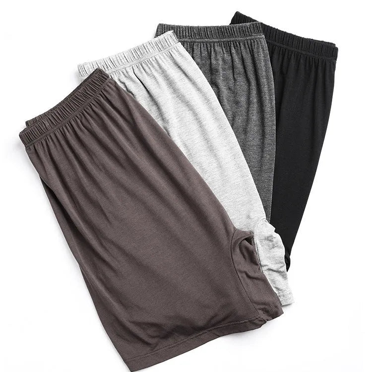 Men's solid colour high-waist boxer shorts in modal fabric on a grey background.